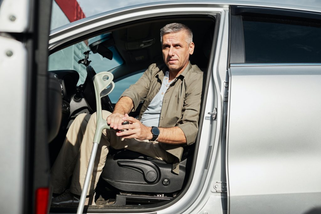 Man with Disability in Car