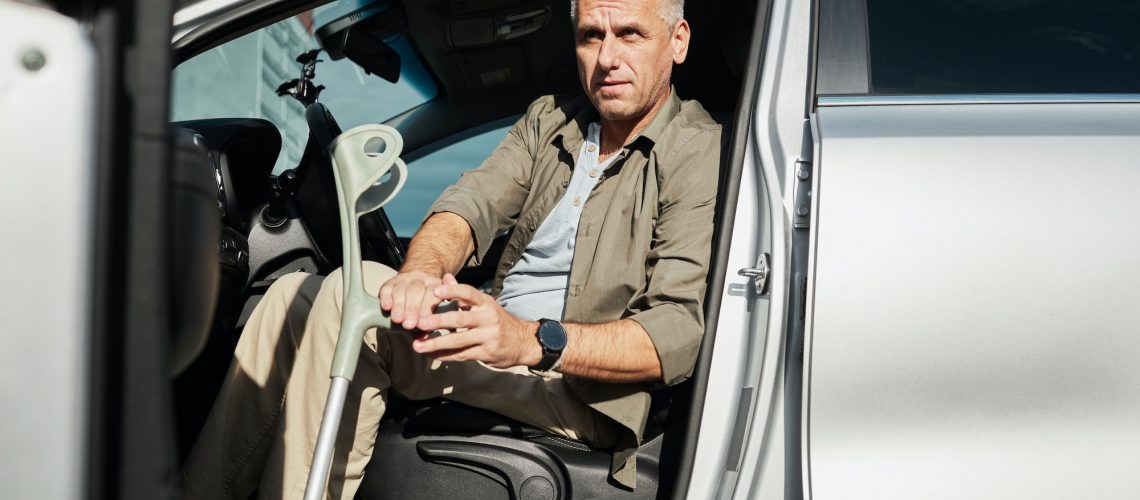 Man with Disability in Car